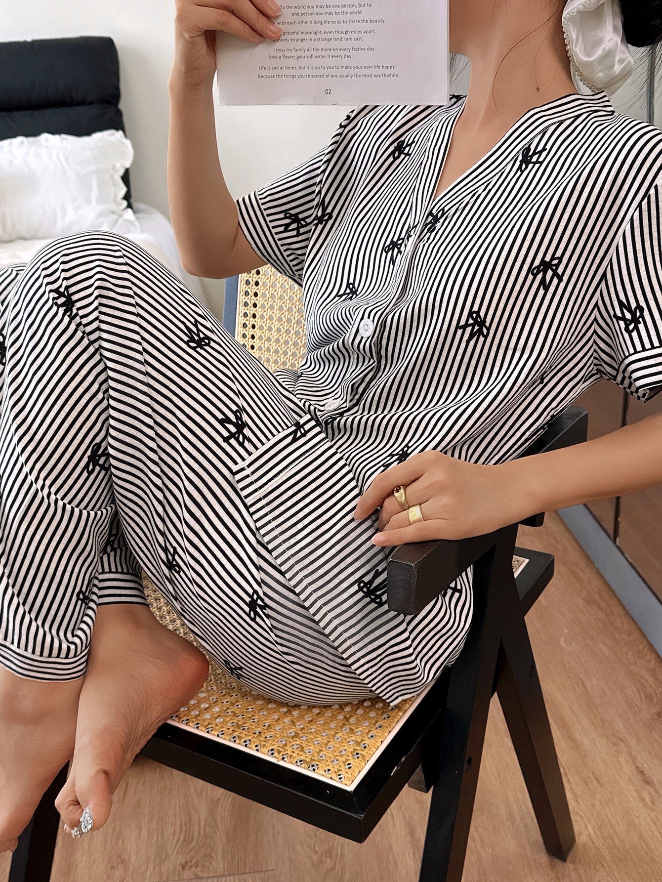 white with black lining all over Bow printed half sleeves Button style Night Suit For Her