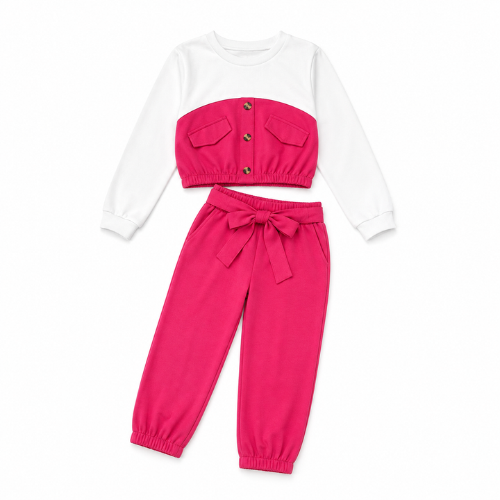 A two-piece children's outfit set featuring a white long-sleeve top with a hot pink cropped vest overlay and matching hot pink jogger pants with a tie waist.