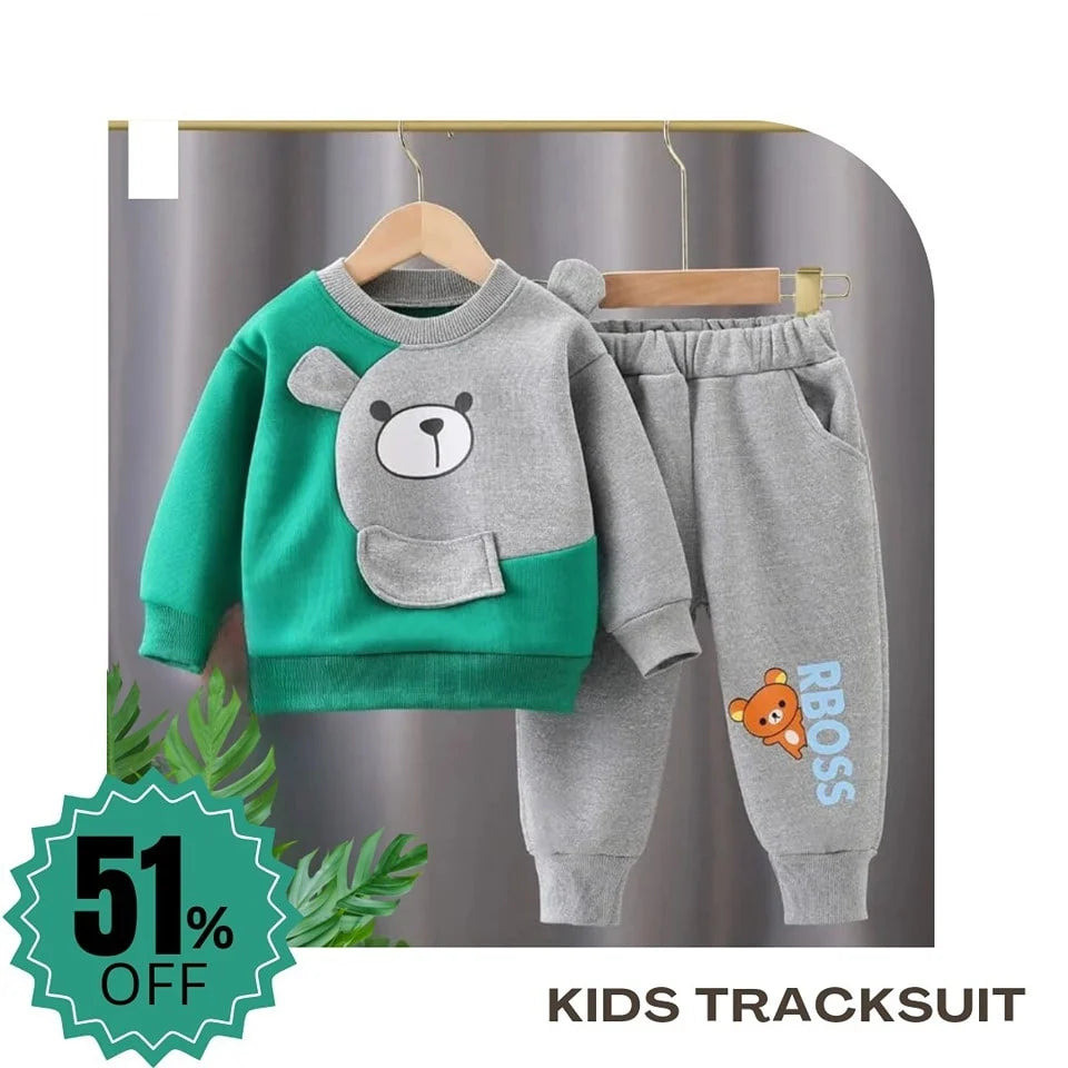 Children's tracksuit with bear design on a hanger against a gray background