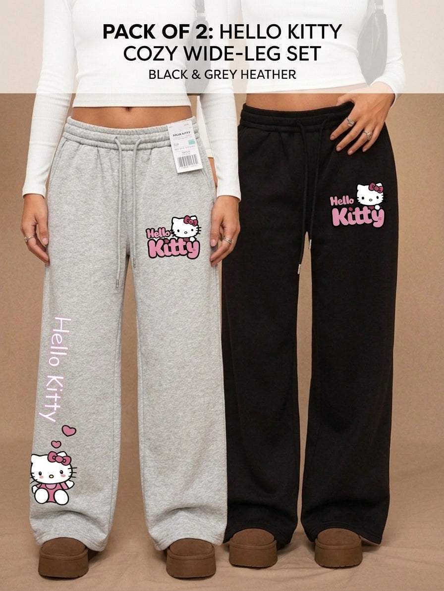 Two models wearing wide-leg sweatpants from a Hello Kitty pack set, one in light heather gray and one in black, both featuring Hello Kitty graphics on the thigh and leg.