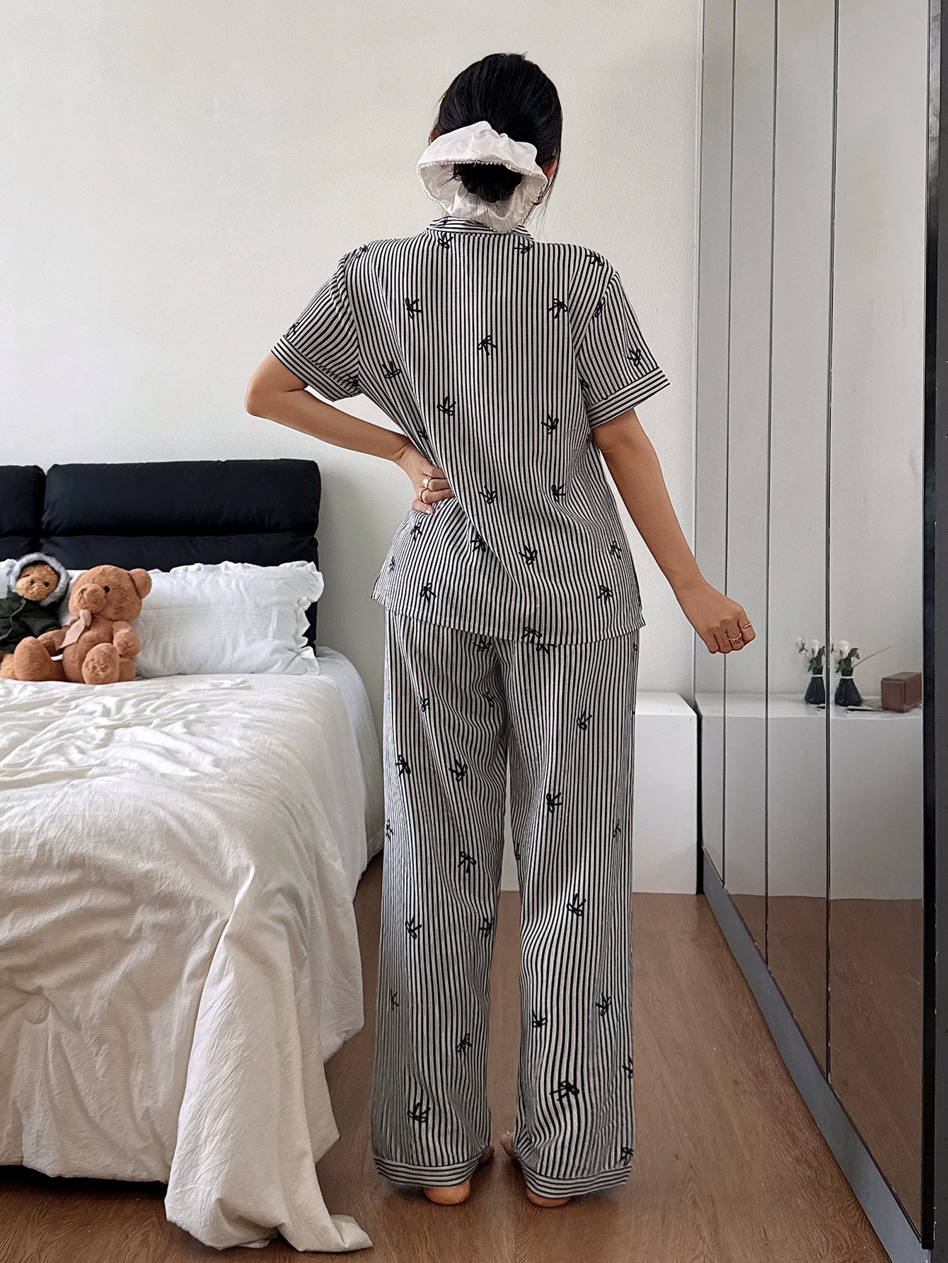 white with black lining all over Bow printed half sleeves Button style Night Suit For Her